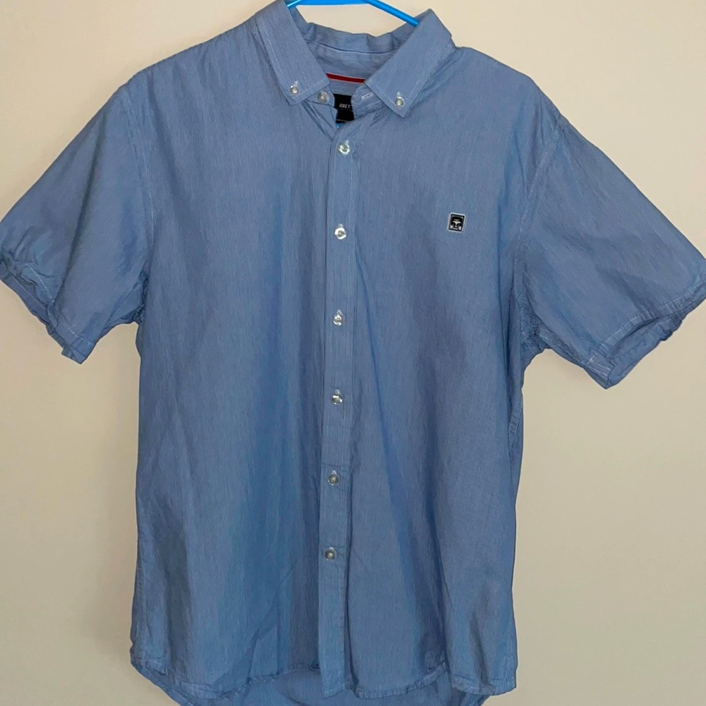 Large Obey blue and white collard shirt